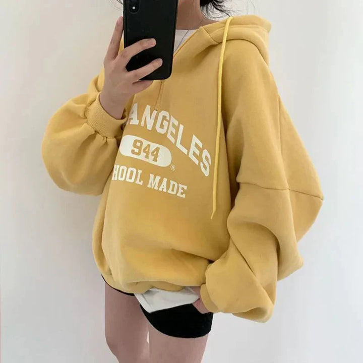 Manon | Oversize bluza z kapturem z nadrukiem w stylu college